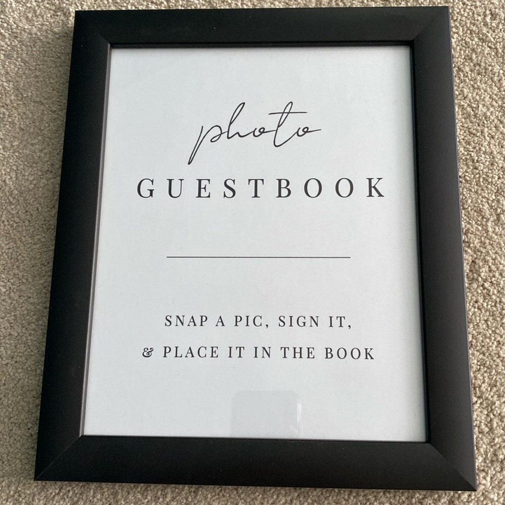 Wedding decor. 8X10 black picture frame. Has guestbook instructions currently.